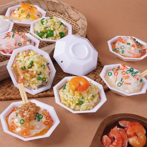Miniature food keychains featuring fried rice and noodles in small hexagonal white bowls
