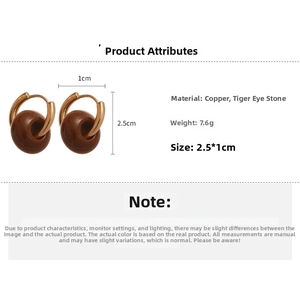 Detail showing vintage tiger eye stone bead earrings with 2.5x1cm size and 7.6g weight