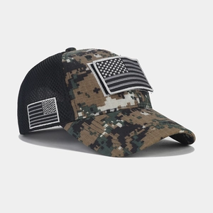 Macro view of tactical camouflage baseball cap with breathable mesh and US flag patch