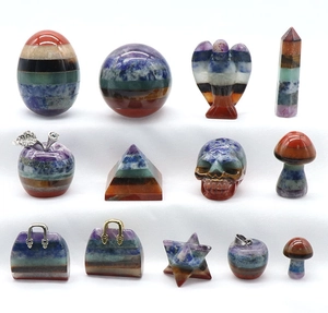 Detailed collection of chakra layered stone carvings in various healing shapes