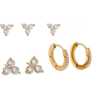 Golden stainless steel earring set featuring clover zircon studs and circular hoops