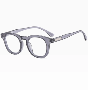 Close-up of gray transparent round frames with metal reinforced core on the inner temples