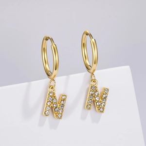 Detailed view of a gold-plated letter N hoop earring featuring micro-pave white zircons