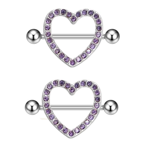 Close-up of heart-shaped stainless steel nipple rings with purple zircon stones