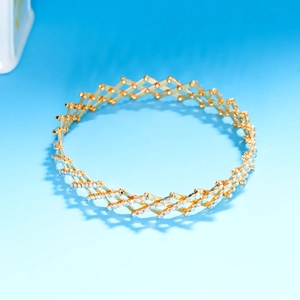 Detail of creative retractable gold ring transforming into a sparkling crystal bracelet