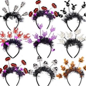 Set of 9 Halloween headbands featuring pumpkins, skulls, spiders and bats with tinsel