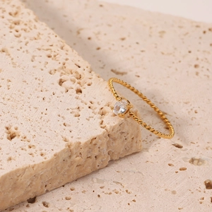 Elegant gold twisted rope ring with a square-cut sparkling zircon stone for women