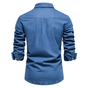 Rear view of classic blue long-sleeve denim shirt with back pleat and refined stitching
