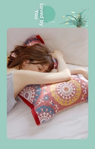 Detailed texture of four-layer cotton gauze pillow towel with ethnic floral pattern