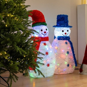 Giant LED glowing Christmas snowmen decorations with colorful lights for festive mall display