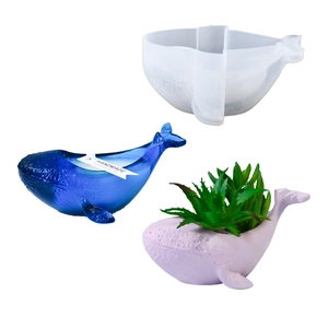 Whale-shaped silicone mold for DIY candles and succulent pots with finished samples