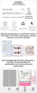 Detail of white gradient press-on nails with glitter cross designs and application tool kit