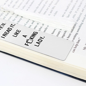 Creative stainless steel bookmark with white tassel and engraved artistic typography