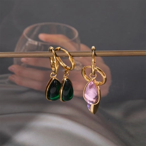 Vintage gold plated teardrop birthstone earrings in emerald green and light pink colors