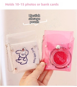 Close-up of clear glitter PVC card holder with blue puppy print and metal bead chain
