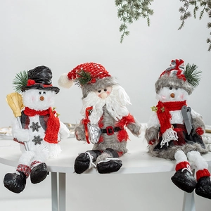 Nordic Christmas dolls set featuring Santa and snowmen on a white table for festive decor
