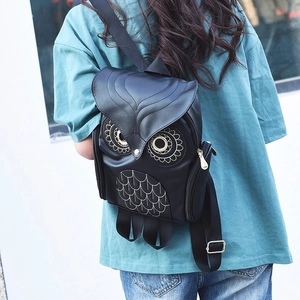 Chic black owl-shaped PU leather backpack with detailed feather embroidery and metal accents