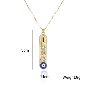 Detail showing dimensions 5cm by 1.1cm and 8g weight of evil eye pendant necklace
