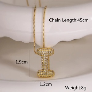 Detailed view of gold letter I pendant with zircons and 45cm box chain dimensions