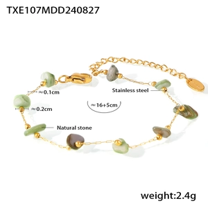 Gold stainless steel bracelet detail with natural green crushed stones and chain length specs