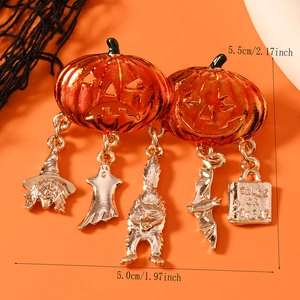 Halloween pumpkin brooch with trick or treat charms measuring 5.5cm by 5.0cm