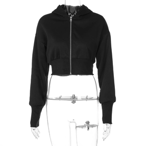 Detail view of black cropped zip-up hoodie featuring long sleeves and metal zipper hardware