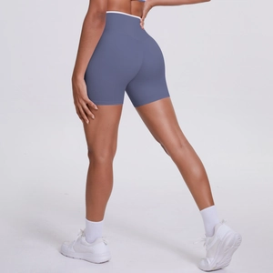 Close-up of blue high-waisted yoga shorts with scrunch butt lifting and wide waistband