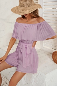 Detail view of purple off-shoulder pleated romper with matching waist belt and chiffon texture