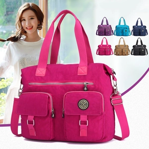 Large capacity nylon travel tote bag for women in rose pink with multiple pockets