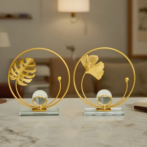 European gold metal leaf sculpture set with crystal balls on glass bases for home decor