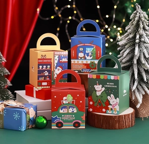 Detailed view of colorful Christmas gift boxes with festive illustrations and sturdy handles