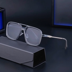 Retro square sunglasses with translucent grey frame and silver metal temples