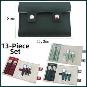 Detailed 13-piece black stainless steel manicure set in a compact button faux leather pouch