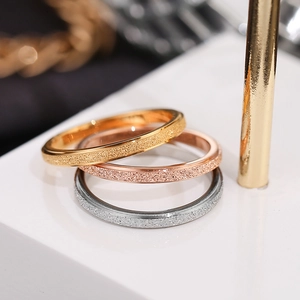Three-piece set of minimalist 18K gold frosted stainless steel rings for daily stacking