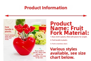 Close-up of heart-shaped stainless steel fruit forks with a weighted stable base
