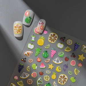 Macro detail of 3D holographic fruit nail stickers with aurora glitter effect patterns