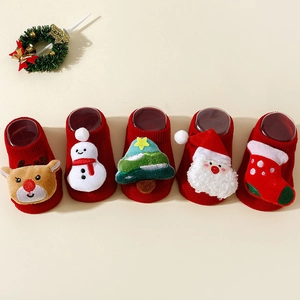 5-pack Christmas baby socks with 3D reindeer and snowman designs on red knit fabric