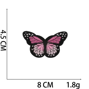 Detailed view of pink butterfly embroidery patch with dimensions 4.5x8cm and clear textures