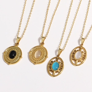 Close-up of vintage 14K gold-plated necklaces with colorful natural stone oval pendants