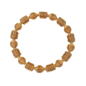 Gold-plated geometric spiral spring bracelet for women featuring an elastic cuff design