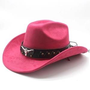 Macro shot of rose red suede cowboy hat with black leather band and silver bull head badge