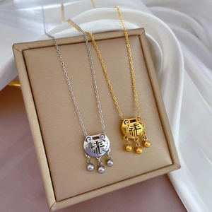 Minimalist titanium steel Fu lock necklace in gold and silver finish with small bells