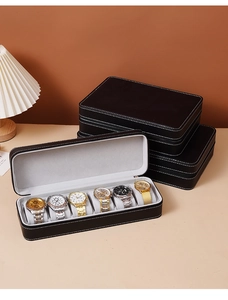Detail of 6-slot black PU leather watch box with white stitching and grey velvet lining