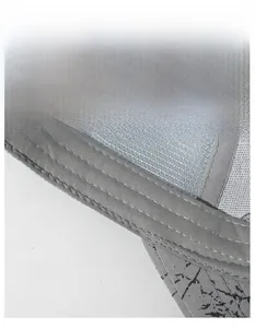 Detail of widened grey sweatband and breathable mesh fabric on summer sun sports hat