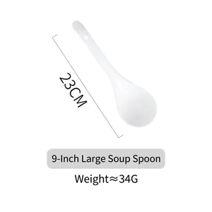 Detail view of 9-inch white ceramic long handle soup spoon with a hanging hole design