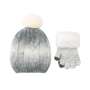 Detail of winter gradient knit hat with white pompom and plush touch-screen gloves set