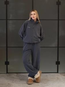 Women's dark gray polar fleece tracksuit with zip-up jacket and wide-leg trousers