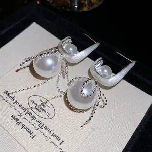 French vintage silver square bow earrings with elegant pearls and long tassel accents