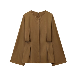 Detail view of brown long sleeve blouse fabric with gathered waist and S size label