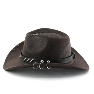 Close-up of brown suede cowboy hat featuring leather band with metal studs and rings
